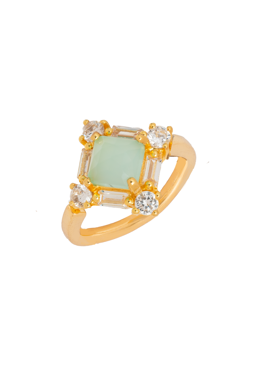 Anillo en forma de rombo con piedra aguamarina central y circonitas incrustadas