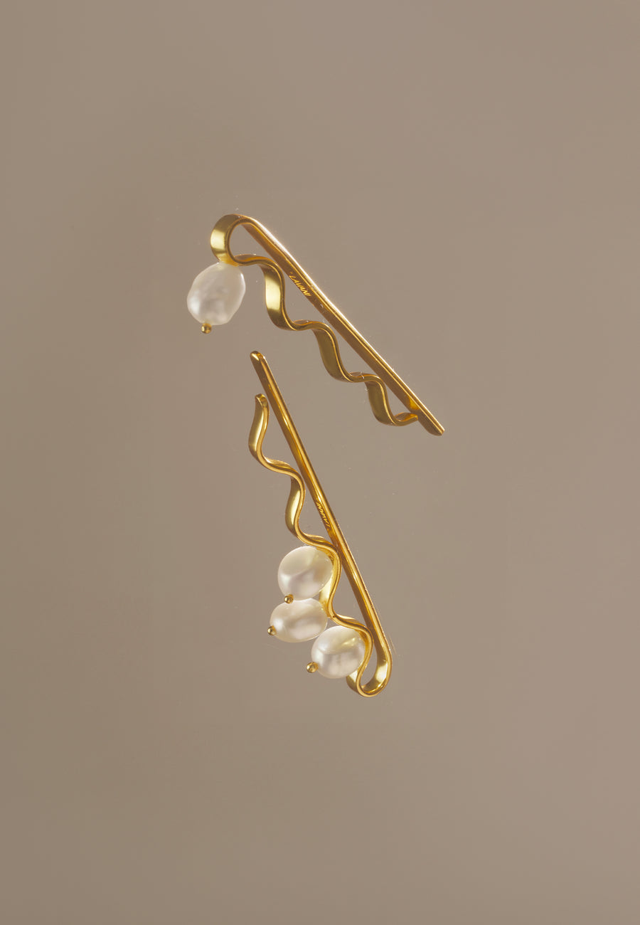 combinación de horquillas con perlas