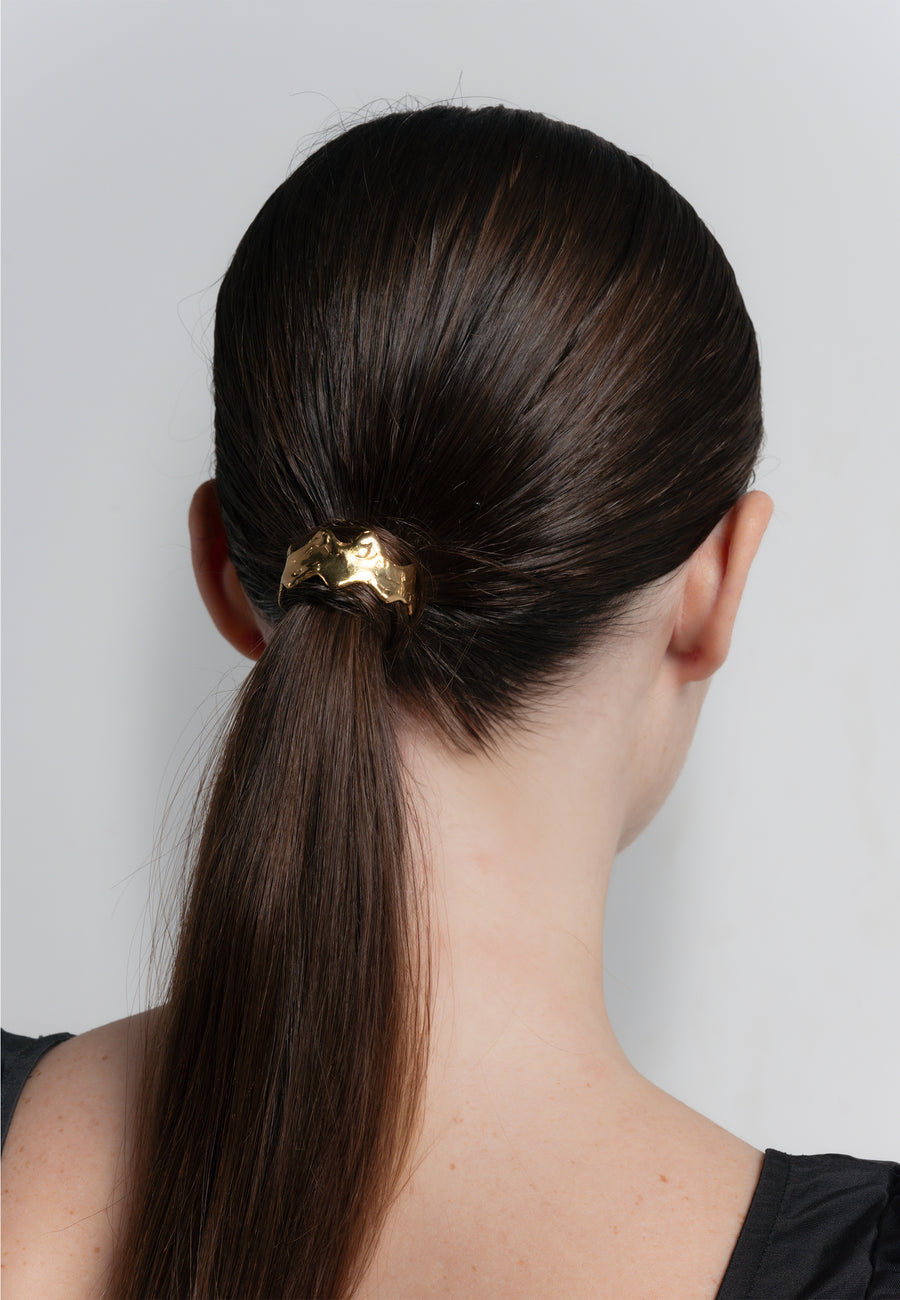 coletero dorado con ondas