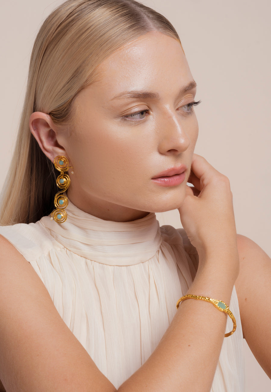 Pendientes de círculo con piedra aguamarina combinado con brazalete aguamarina