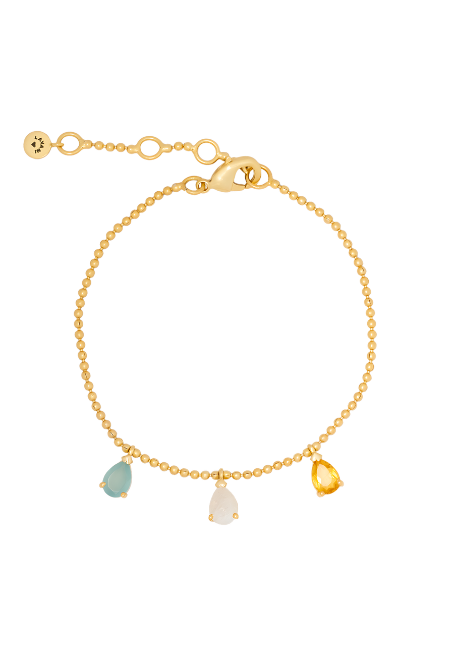 Pulsera en tendencia con charms en tonos pastel