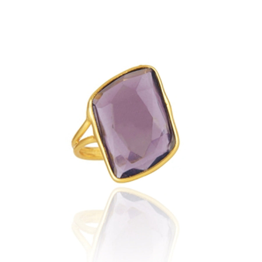 Parte frontal de anillo con piedra semipreciosa morada