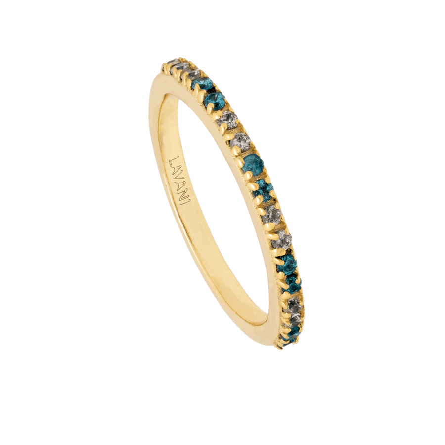 Anillo dorado minimalista con circonitas aguamarina.