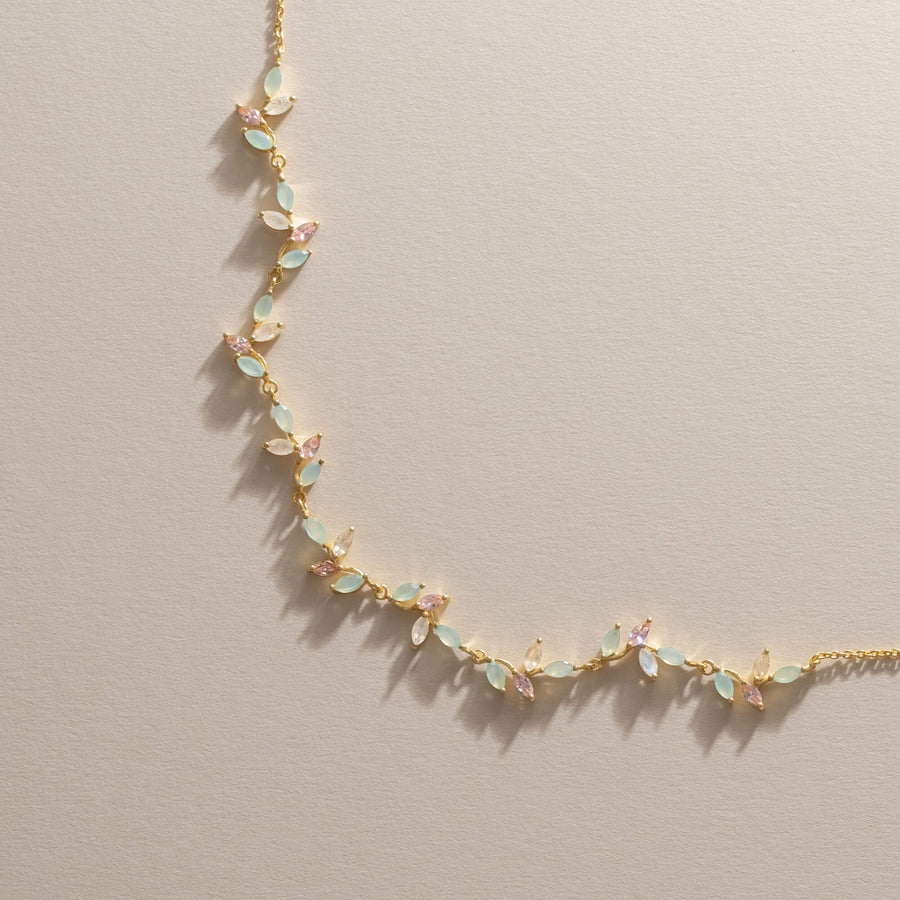 Colgante Padma con hojas de flor de loto blanco rosa aguamarina