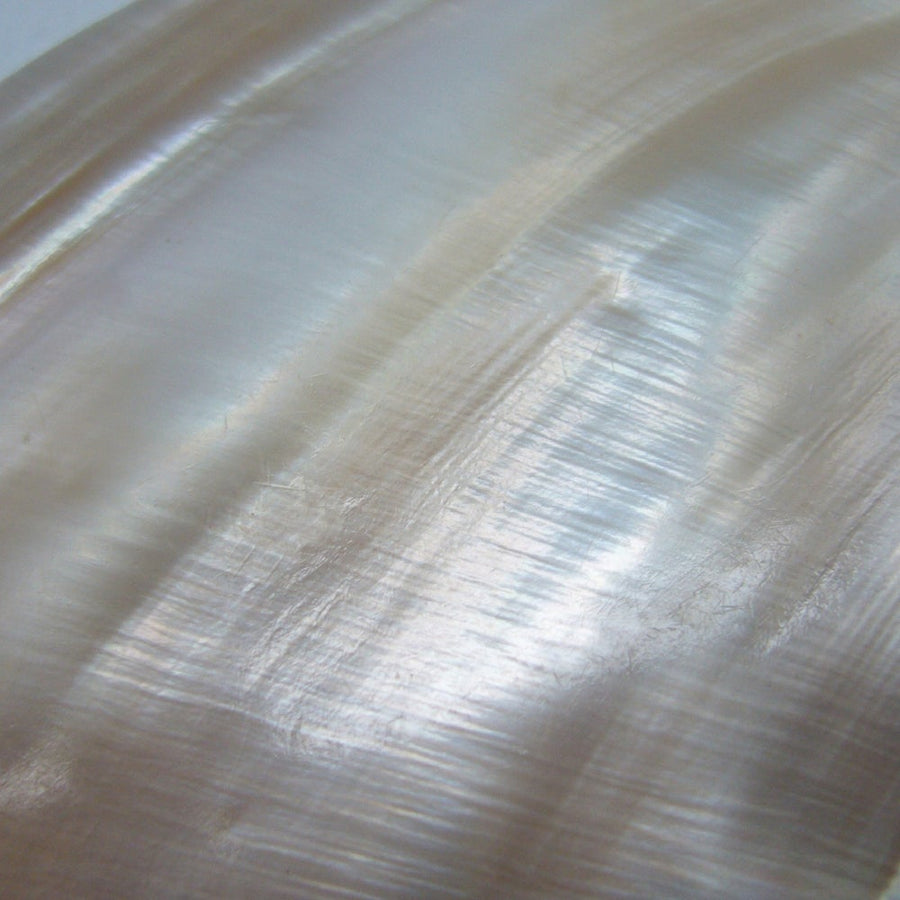 textura de piedra natural madreperla con reflejos de luz