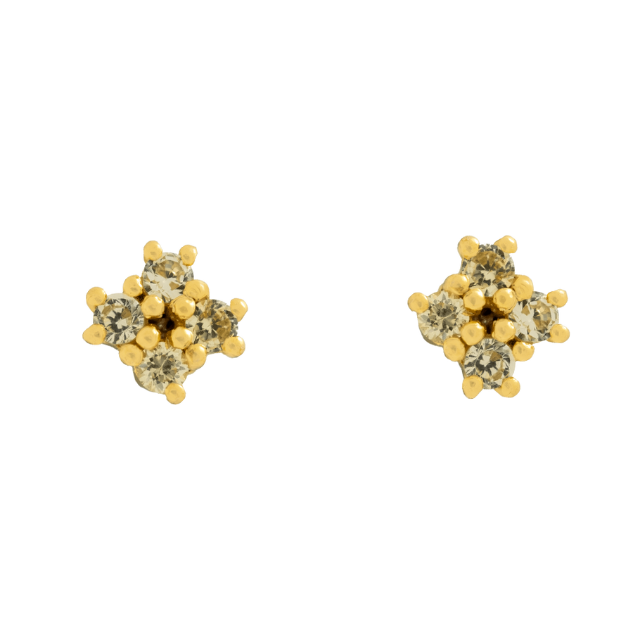 Piercing sencillo con forma de flor adornado con circonitas de color verde y un baño de oro certificado.