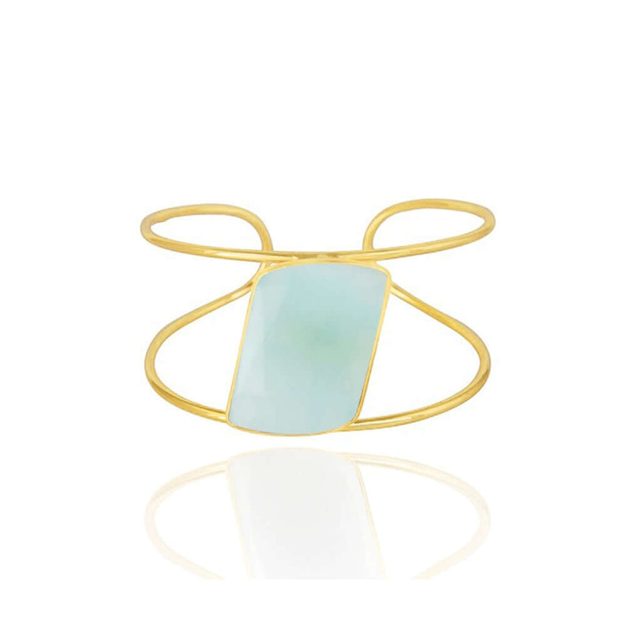 Brazalete dorado ancho con piedra aguamarina