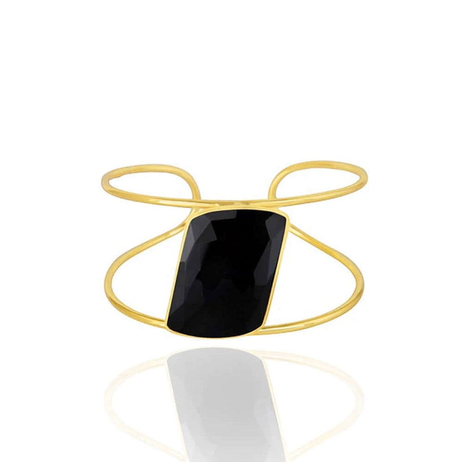 Brazalete ancho perfecto para eventos con una piedra geometrica negra