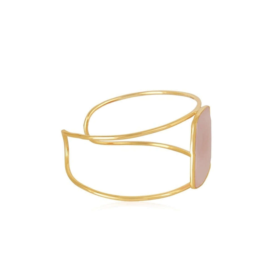 Perfil de brazalete bañado en oro con piedra rosa