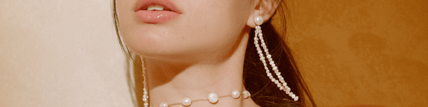 pendientes largos de perlas