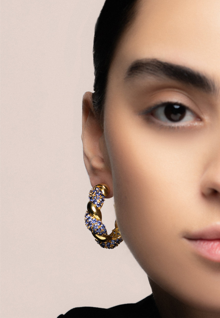  Pendientes estilo aros azules con piedras circonitas bañados en oro