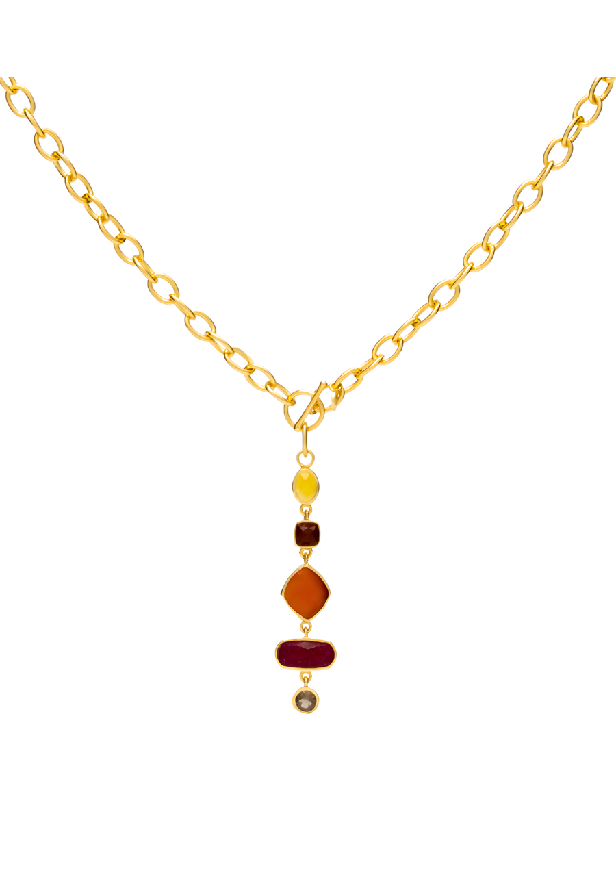 Collar Louise Tierra largo dorado con piedras en distintas formas geométricas de fiesta