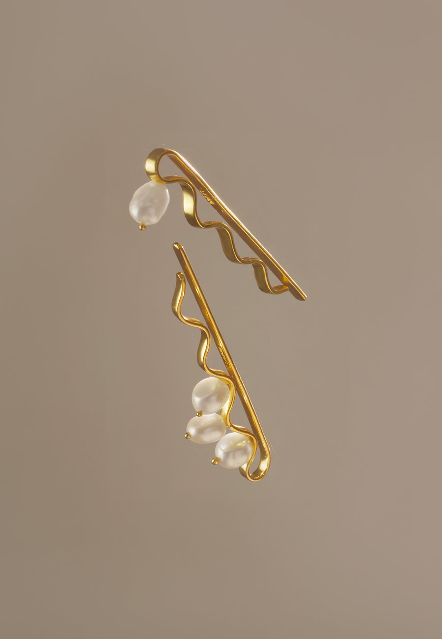 Combinación de horquillas de perlas doradas