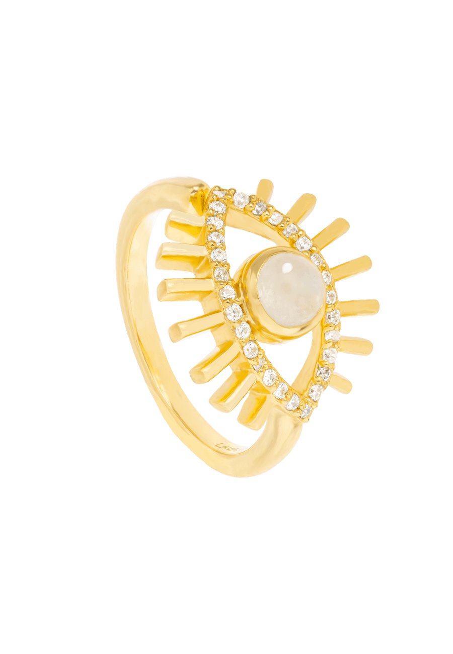 anillo de ojo turco con piedraluna natural en blanco, circonitas y salientes representando las pestañas bañado en oro de 18 quilates