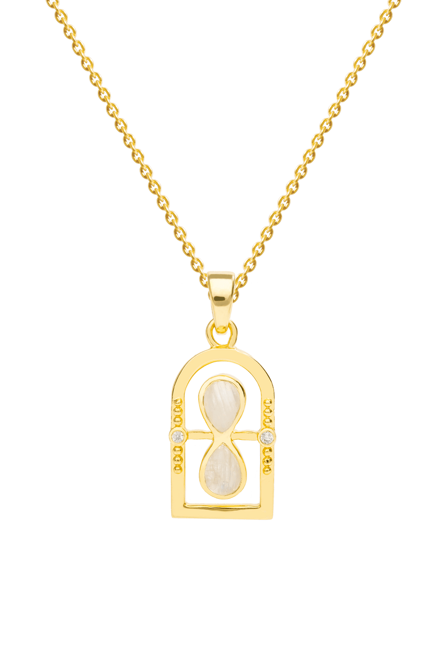 colgante reloj de arena dorado con piedra blanca diseño exclusivo de lavani jewels
